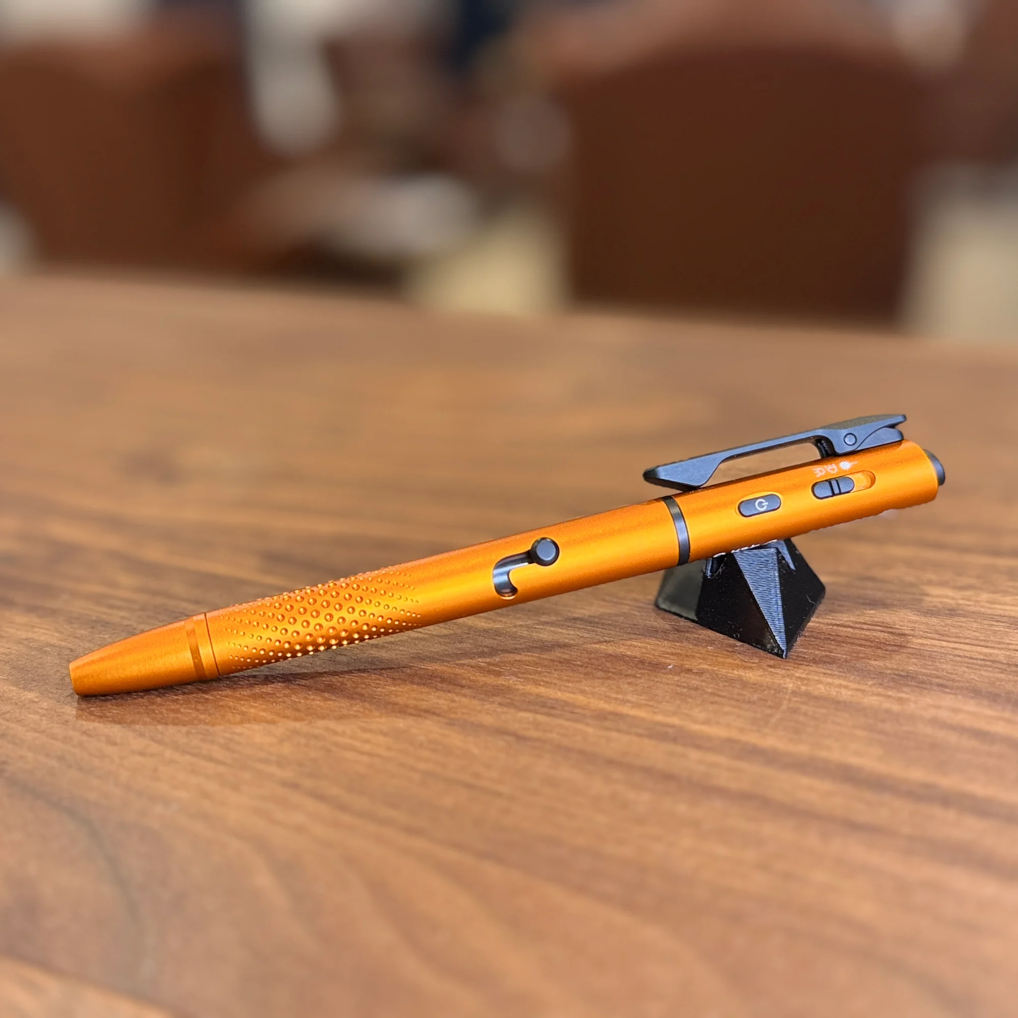 Orange Olight Flashlight Pen